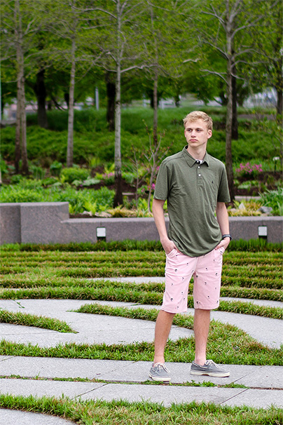 senior guy standing in maze