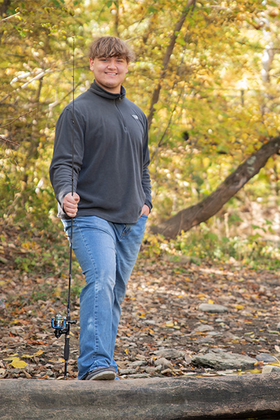 senior guy with fishing pole